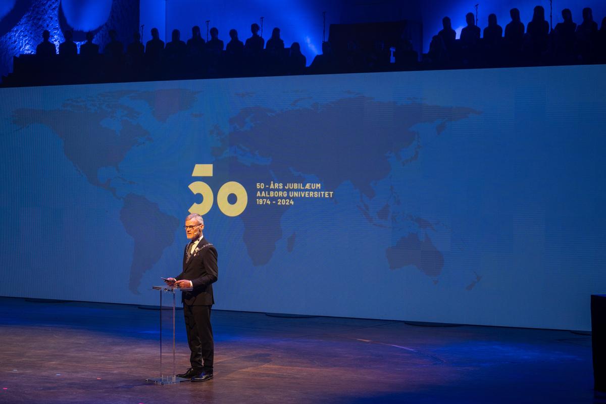 Rector Per Michael Johansen on stage